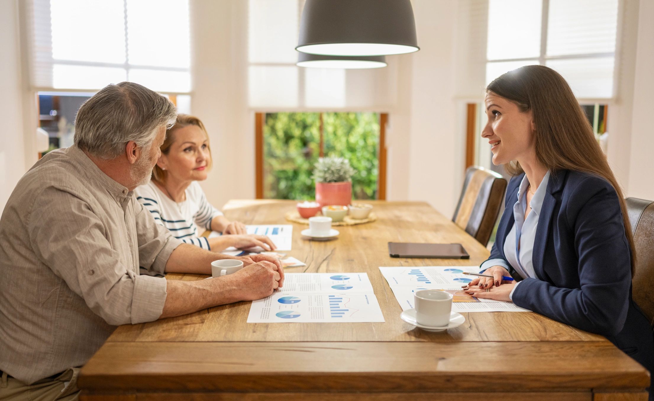 Family reviewing planning documents together